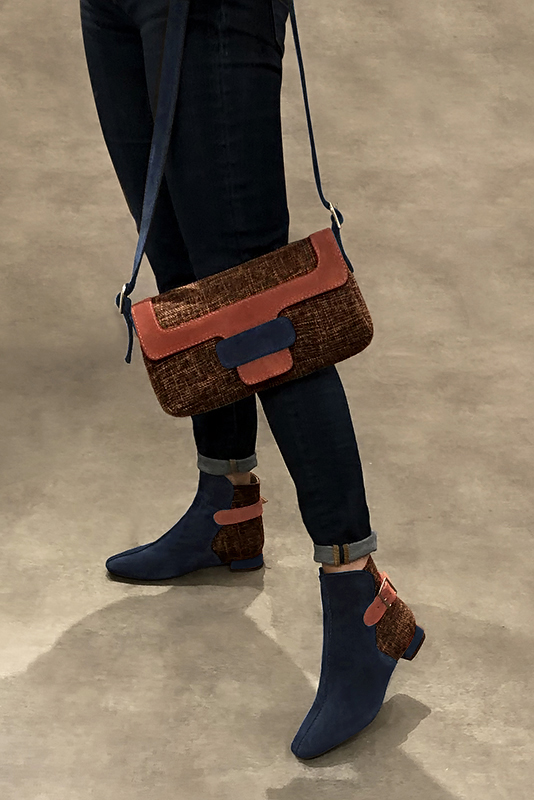 Midnight blue and terracotta orange women's ankle boots with buckles at the back. Square toe. Flat flare heels. Worn view - Florence KOOIJMAN
